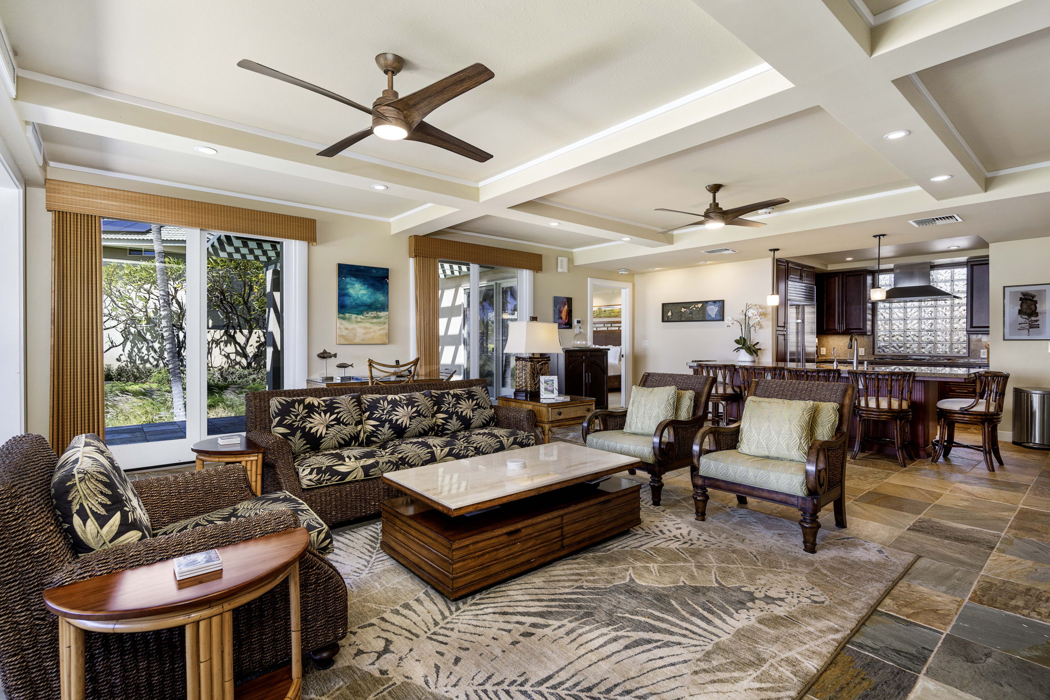 62-3600 Amaui Place, Unit F102 Kamuela, HI 96743 - Photo 10 of 27 a living room with furniture a large window and a rug