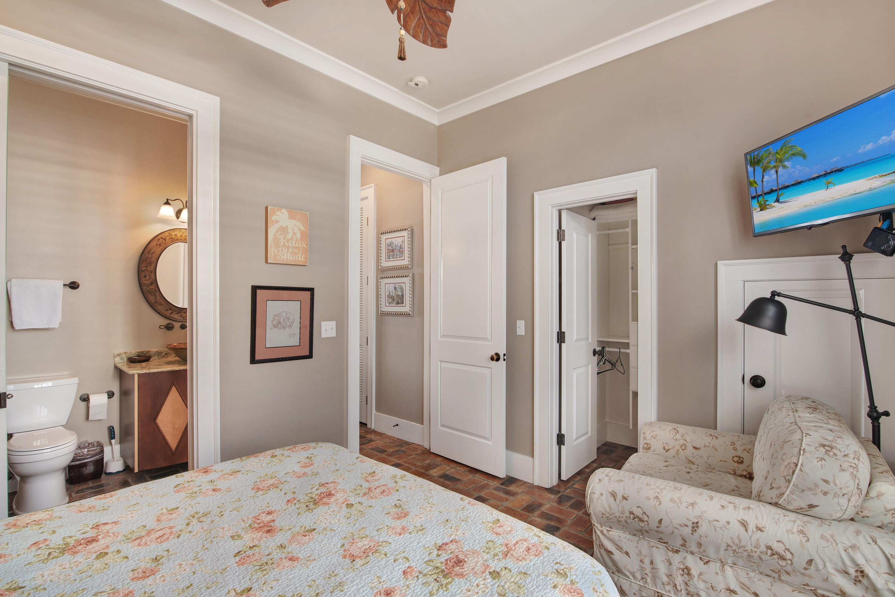 4484 Ocean View Drive Destin, FL 32541 - Photo 12 of 40 a bedroom with a bed and a dresser