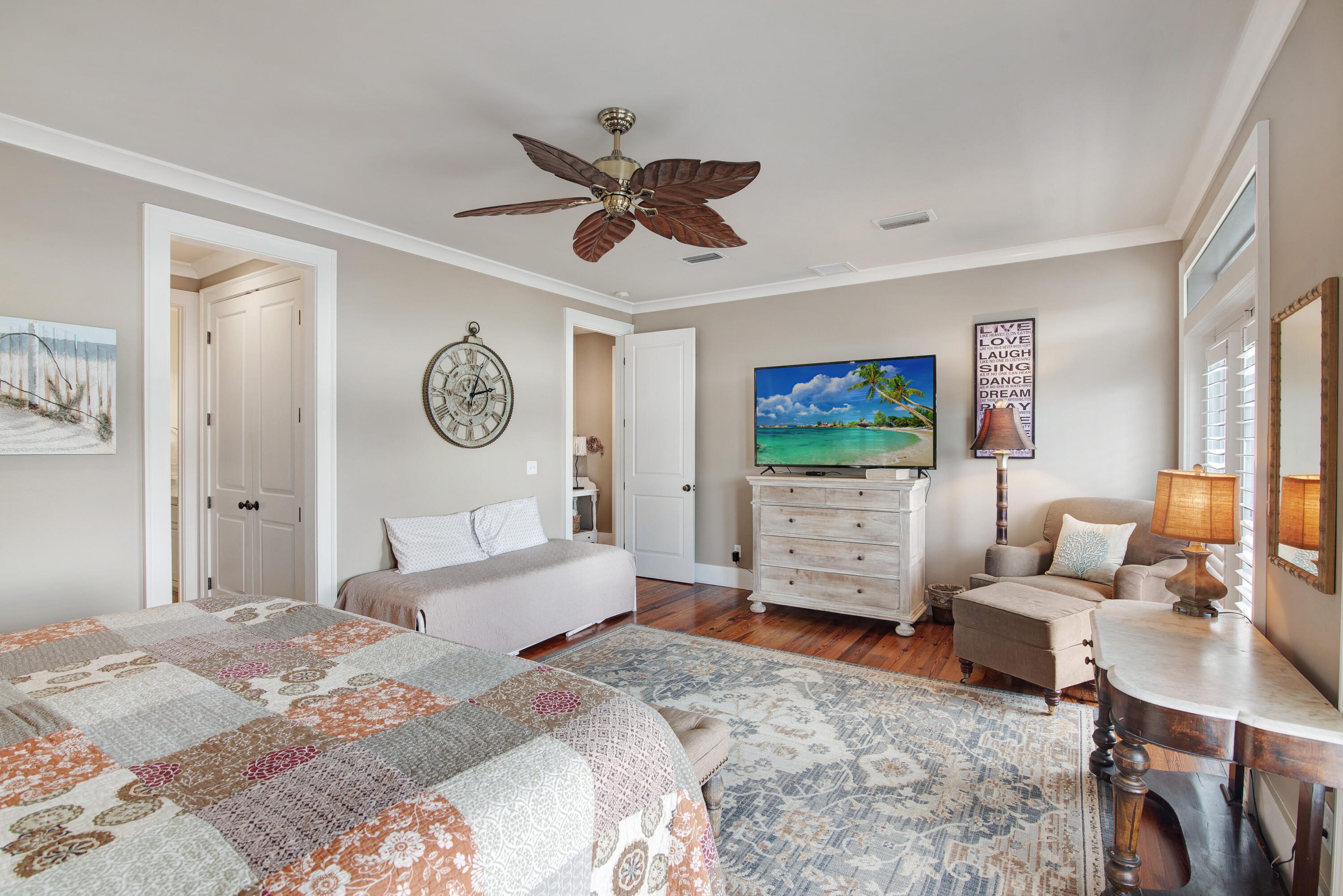 4484 Ocean View Drive Destin, FL 32541 - Photo 14 of 40 a bedroom with a bed furniture and a flat screen tv