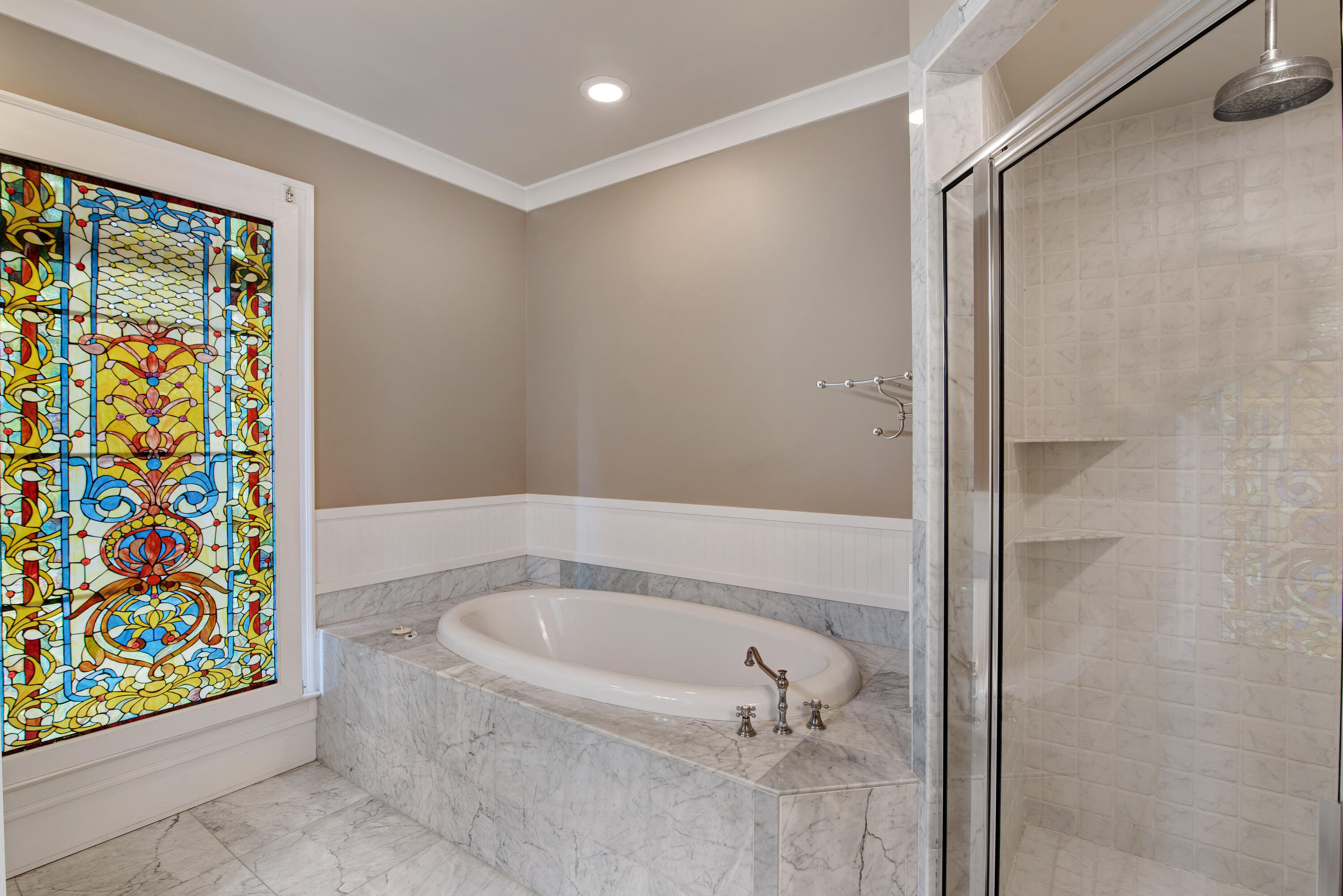 4484 Ocean View Drive Destin, FL 32541 - Photo 23 of 40 a bathroom with a bathtub and shower