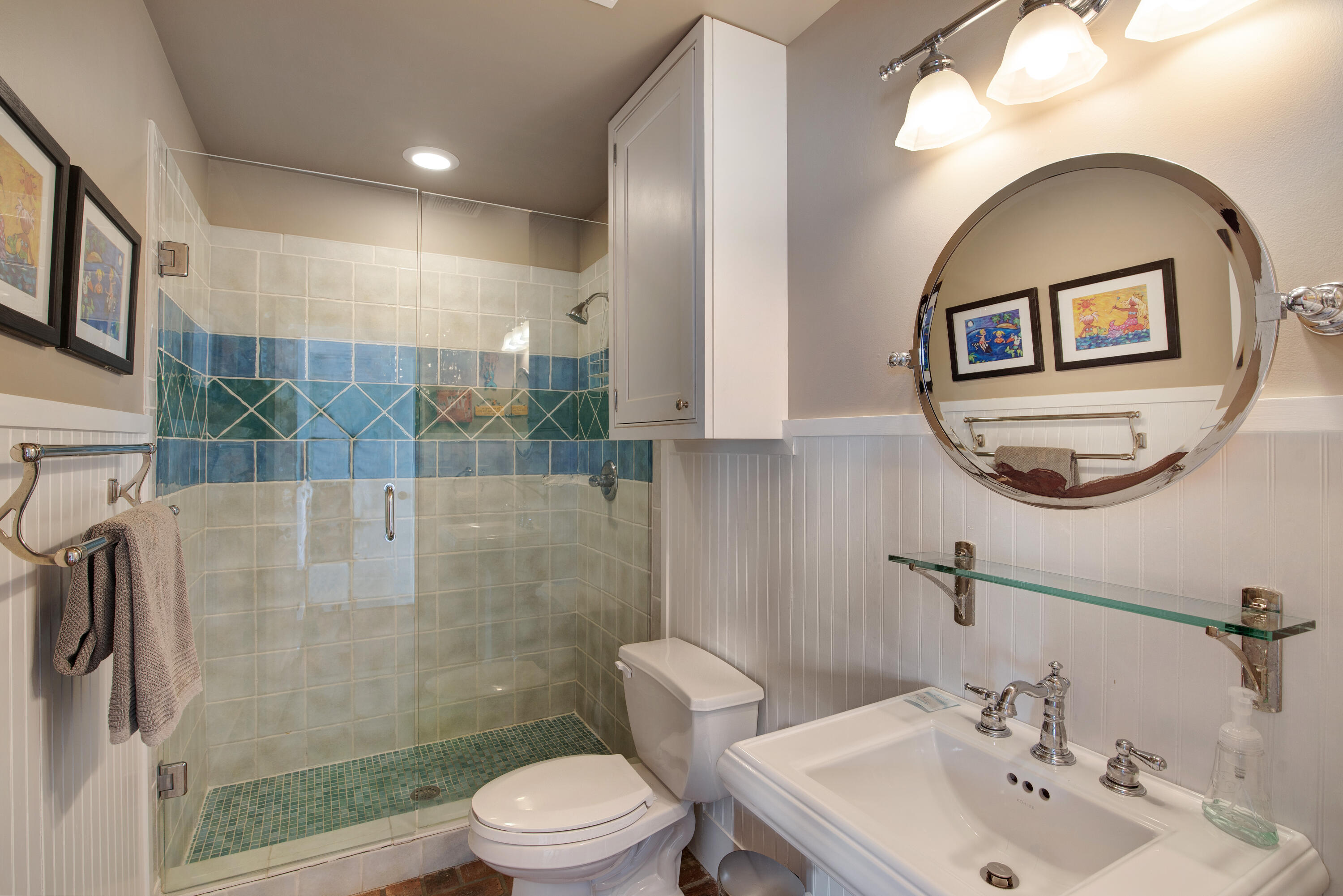 4484 Ocean View Drive Destin, FL 32541 - Photo 26 of 40 a bathroom with a toilet sink and a mirror