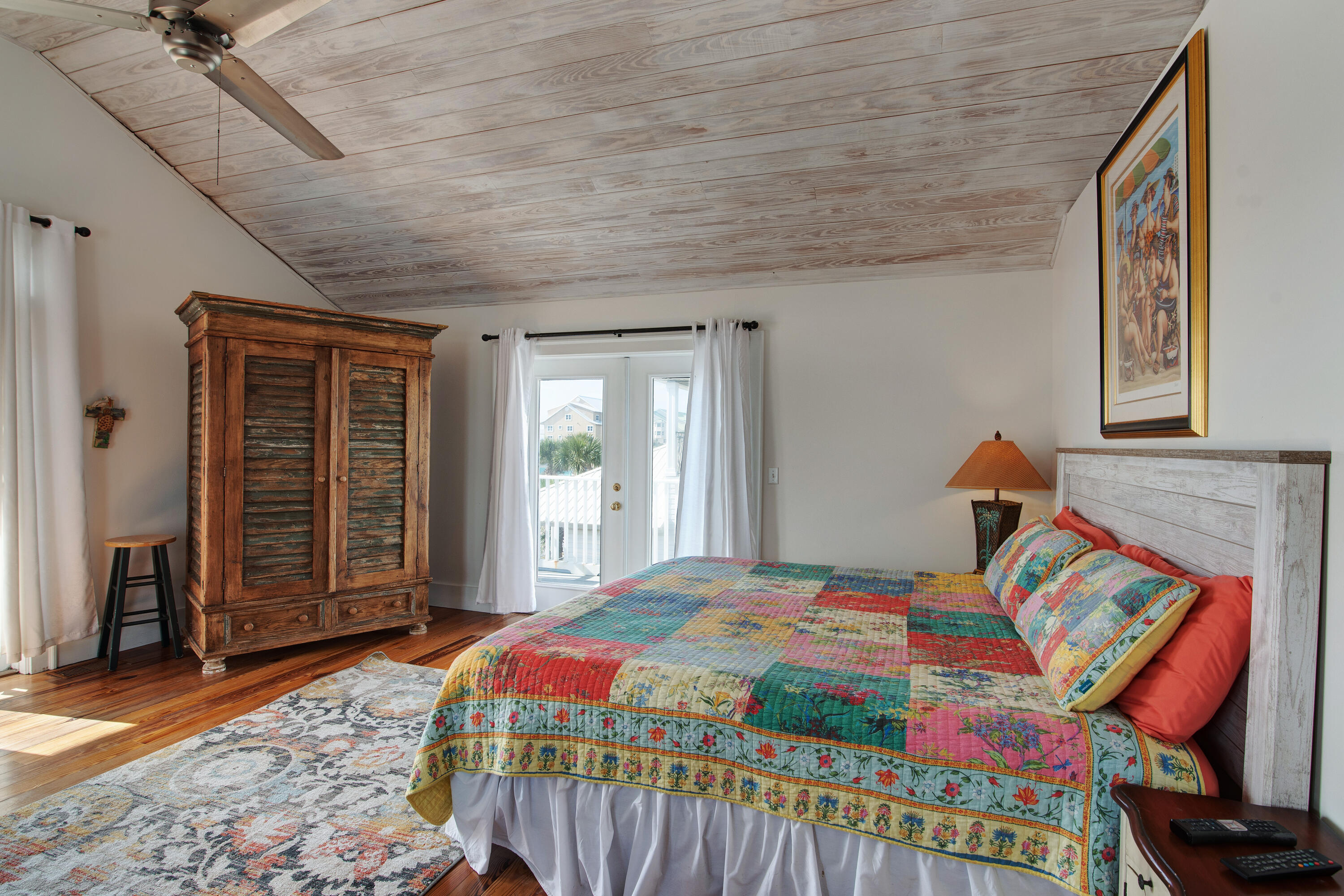 4484 Ocean View Drive Destin, FL 32541 - Photo 27 of 40 a bedroom with a bed and a painting on the wall