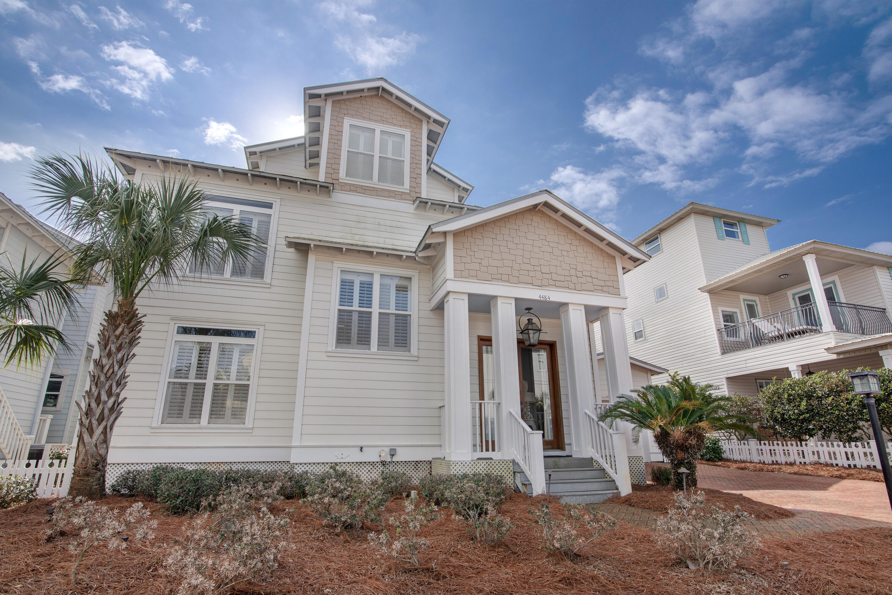 4484 Ocean View Drive Destin, FL 32541 - Photo 37 of 40 a front view of a house with garden