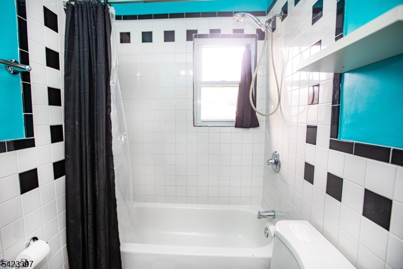 1130 Valley Road, Unit 2B Wayne, NJ 07470 - Photo 23 of 47 a bathroom with a bathtub and a shower