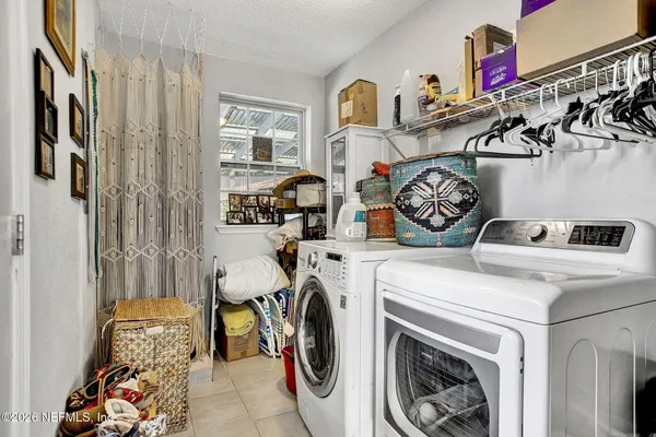 a storage room with washer and dryer