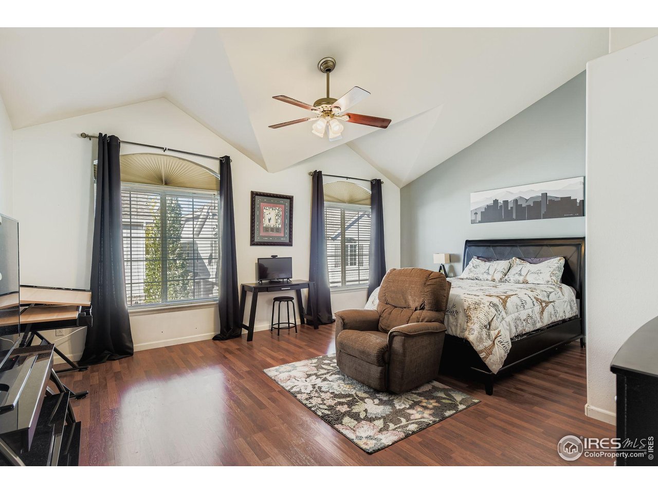 8320 Stonybridge Circle Highlands Ranch, CO 80126 - Photo 6 of 9 a living room with furniture and a large window