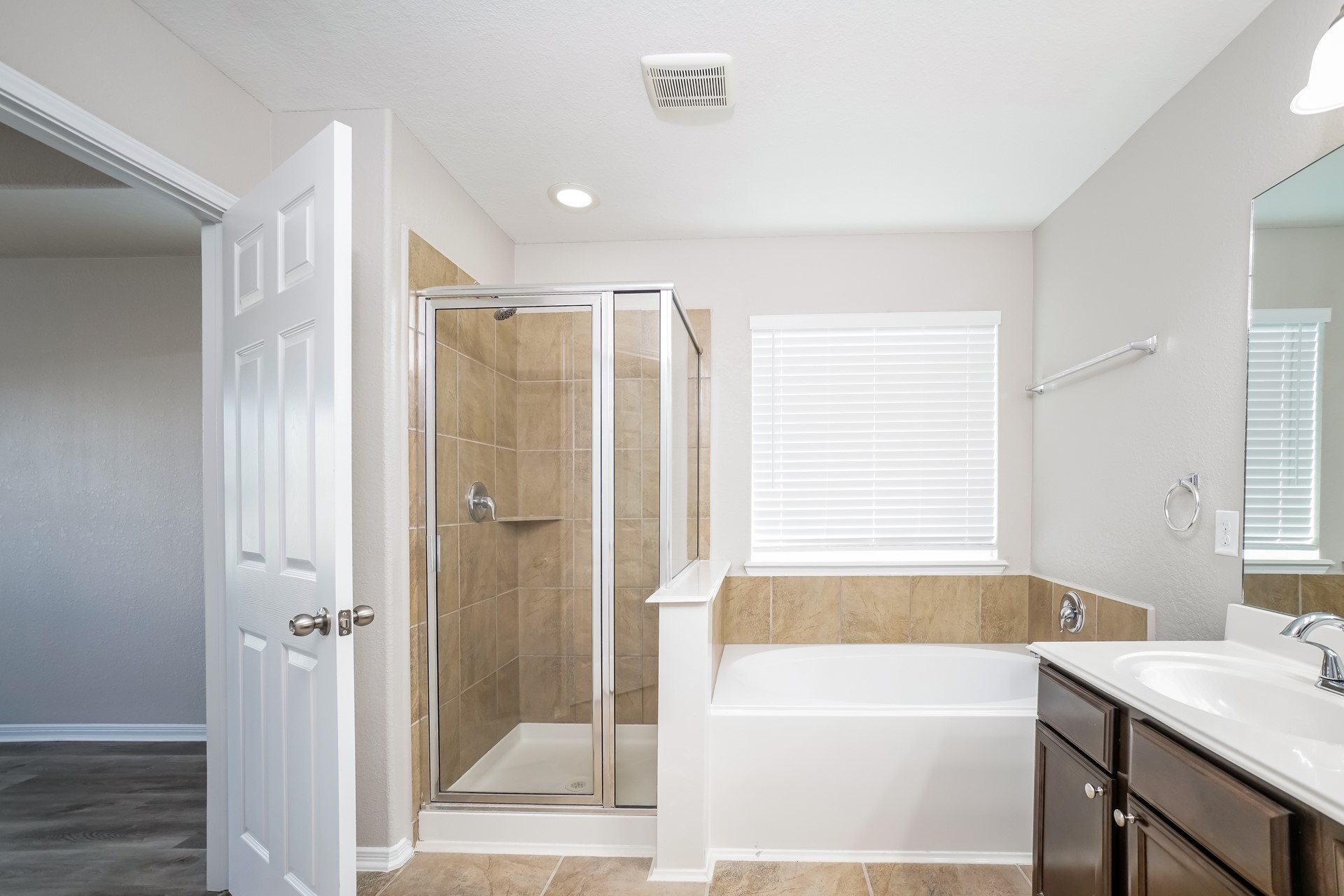 2694 Elm Crossing Trail Spring, TX 77386 - Photo 12 of 17 a bathroom with a tub sink shower and a mirror