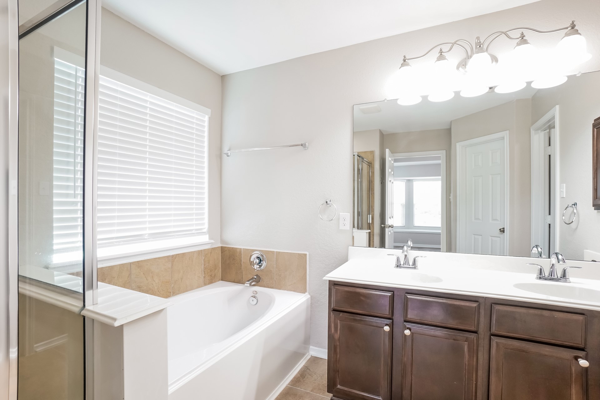 2694 Elm Crossing Trail Spring, TX 77386 - Photo 13 of 17 a bathroom with a tub sink and mirror