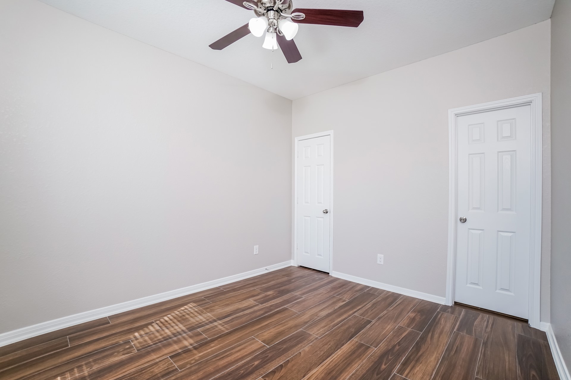 2694 Elm Crossing Trail Spring, TX 77386 - Photo 16 of 17 a view of an empty room with wooden floor