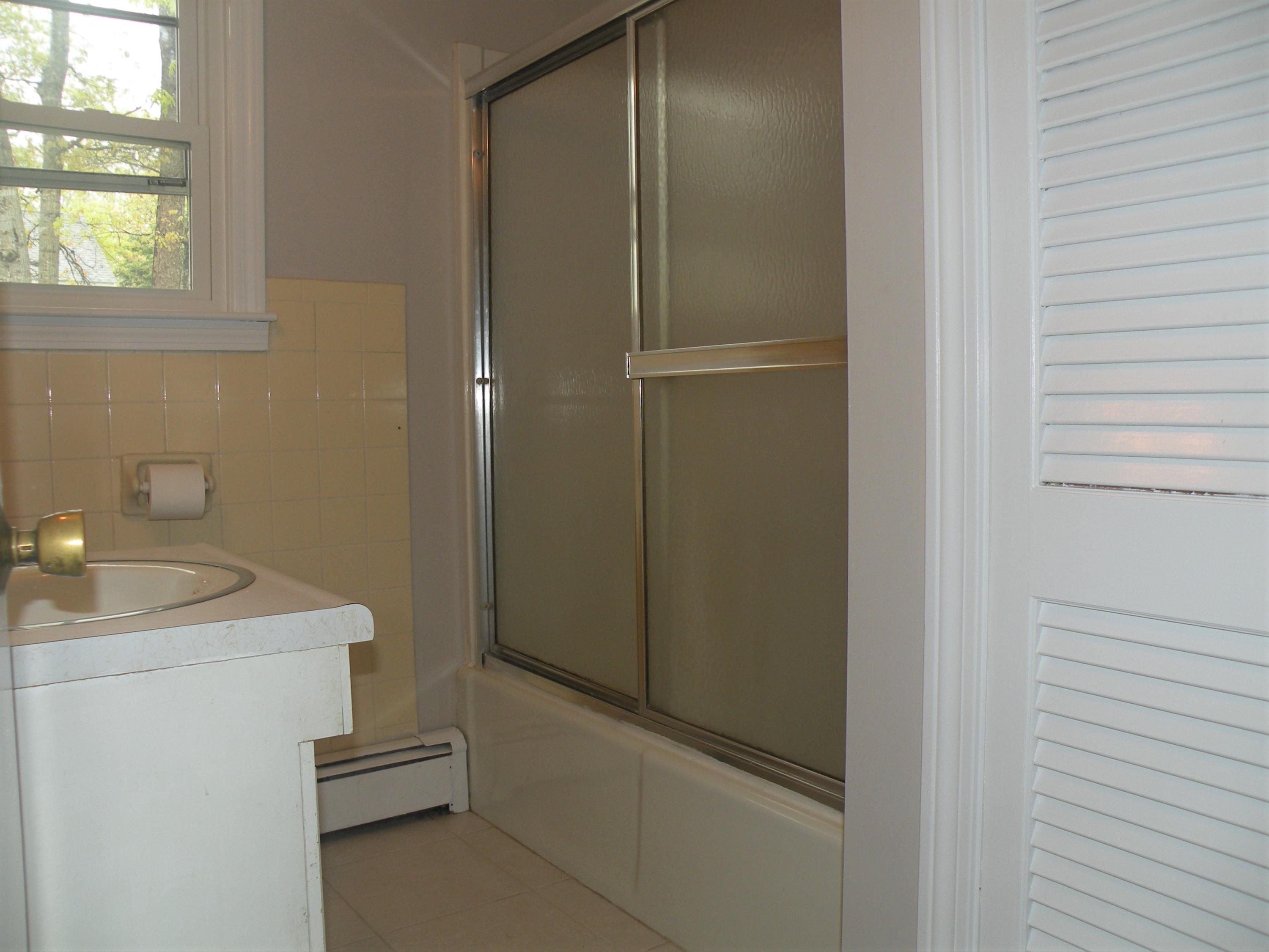 153 Harbor Hills Road Centerville, MA 02632 - Photo 17 of 18 a bathroom with a sink and vanity