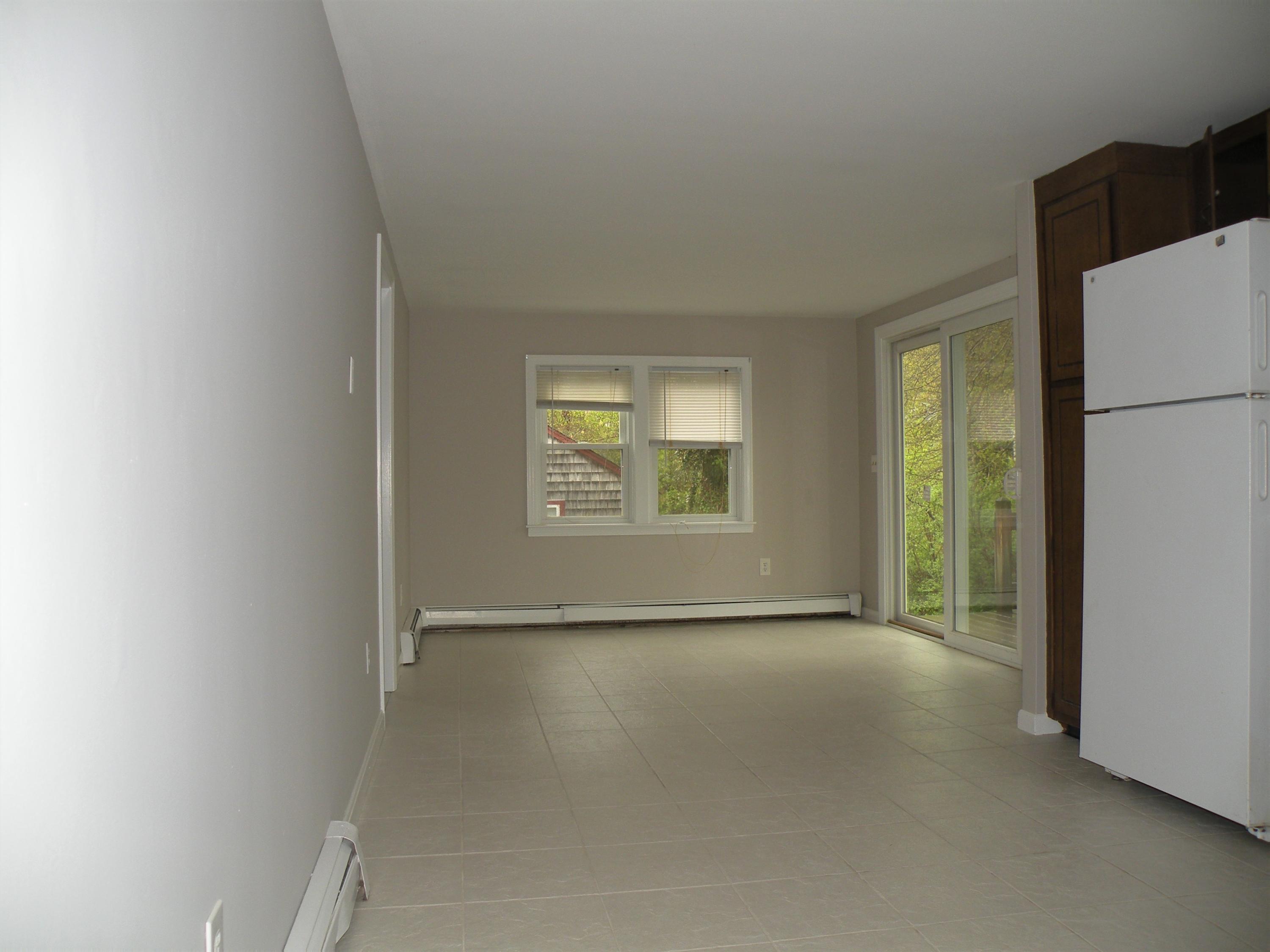 153 Harbor Hills Road Centerville, MA 02632 - Photo 8 of 18 a view of an empty room with a window