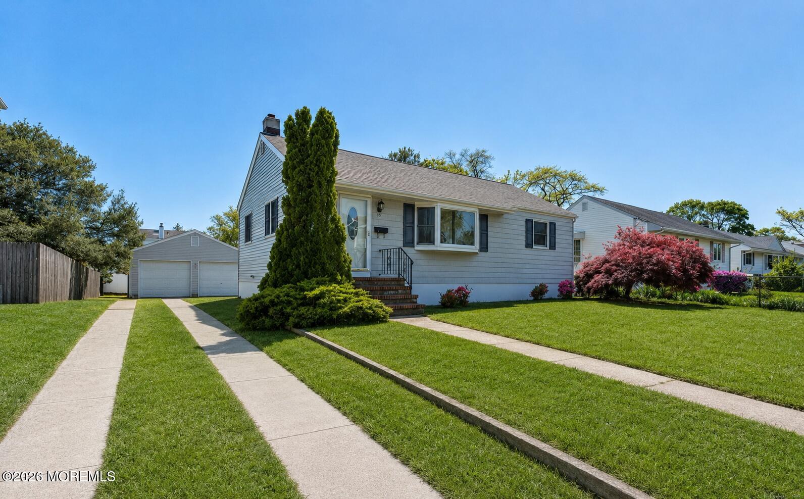 624 North Manetta Drive Point Pleasant, NJ 08742 - Photo 1 of 27 a front view of a house with a yard