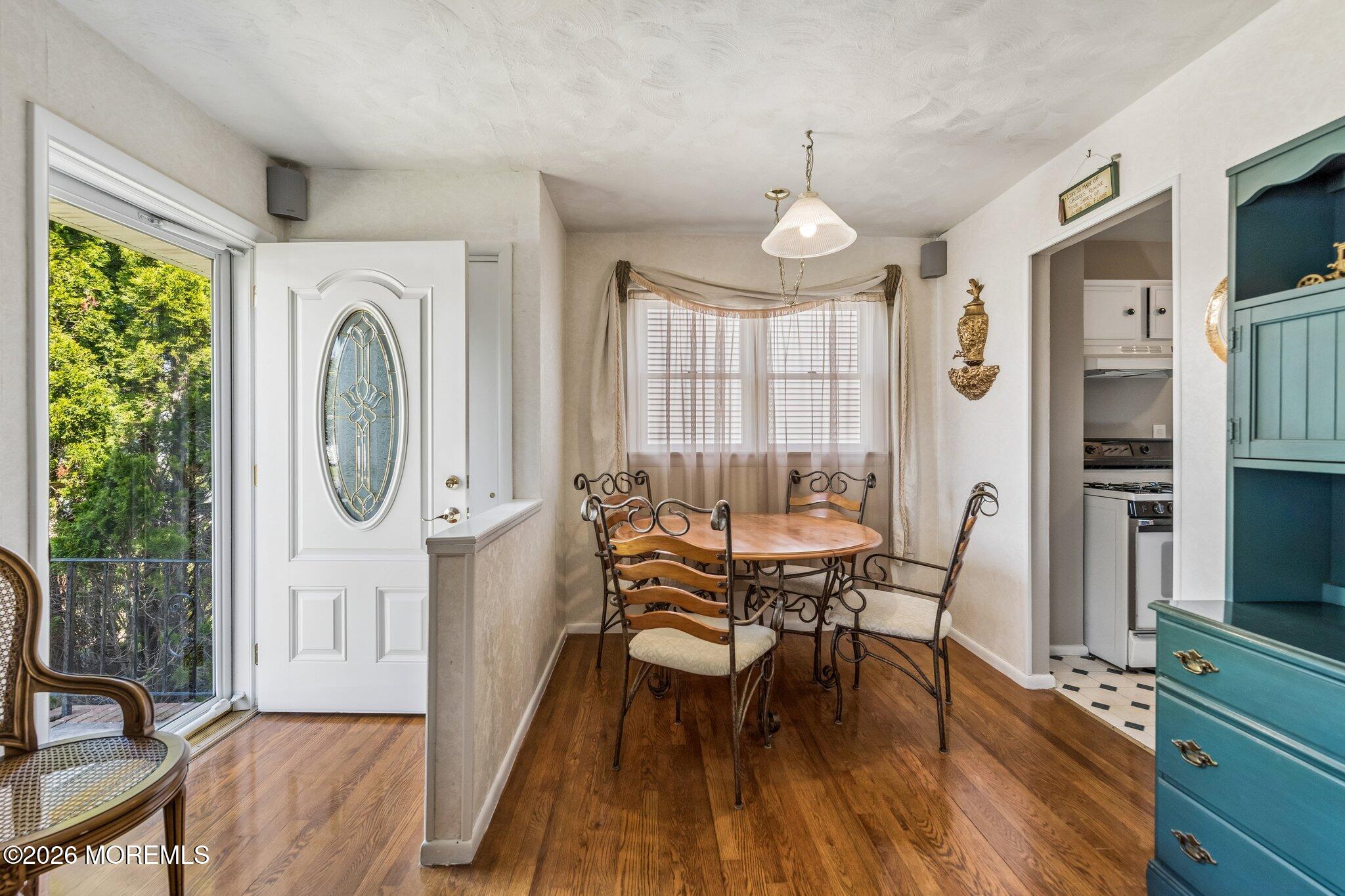 624 North Manetta Drive Point Pleasant, NJ 08742 - Photo 18 of 27 a view of a dining room with furniture window and wooden floor