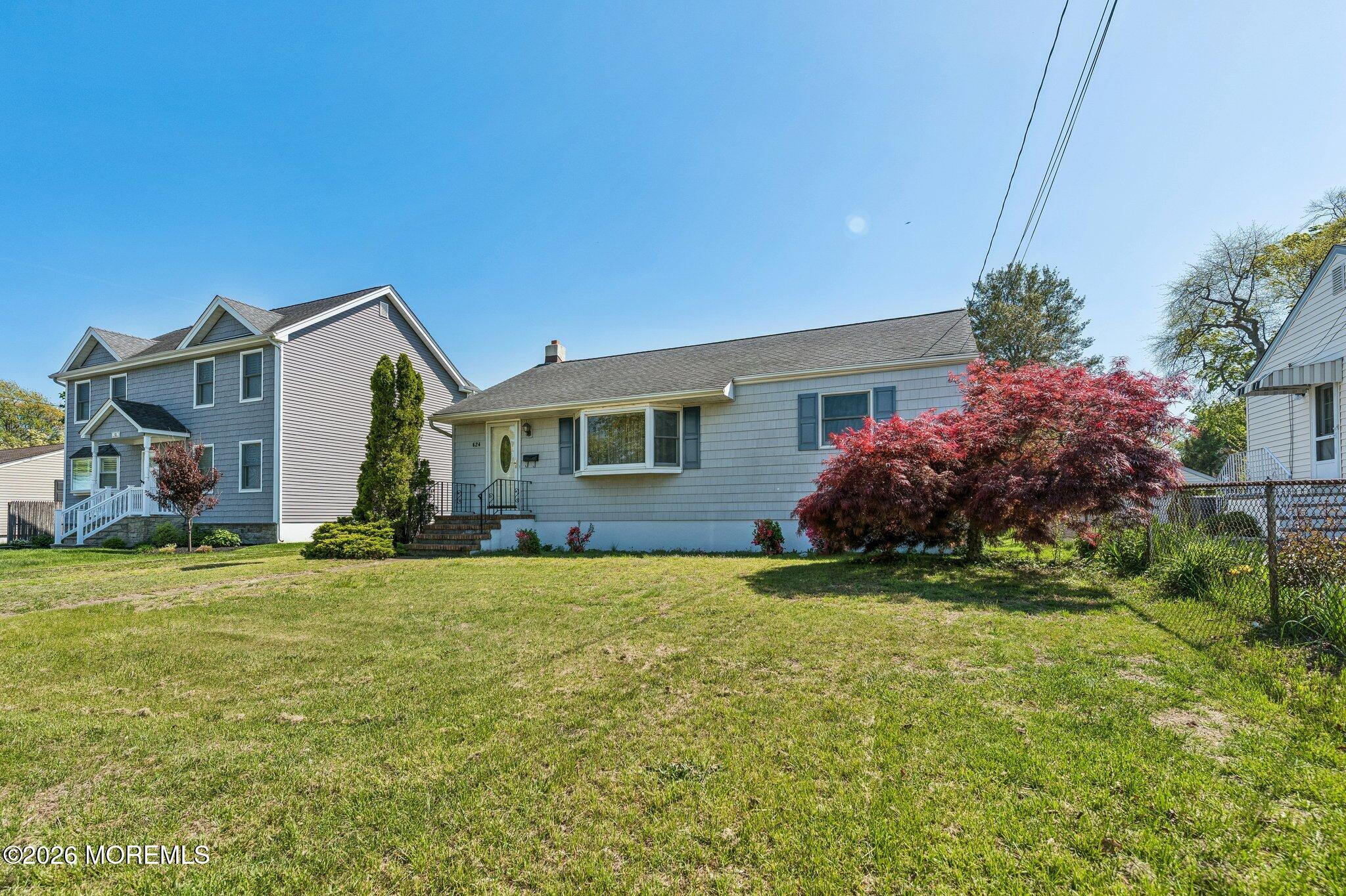 624 North Manetta Drive Point Pleasant, NJ 08742 - Photo 3 of 27 a front view of house with yard and green space