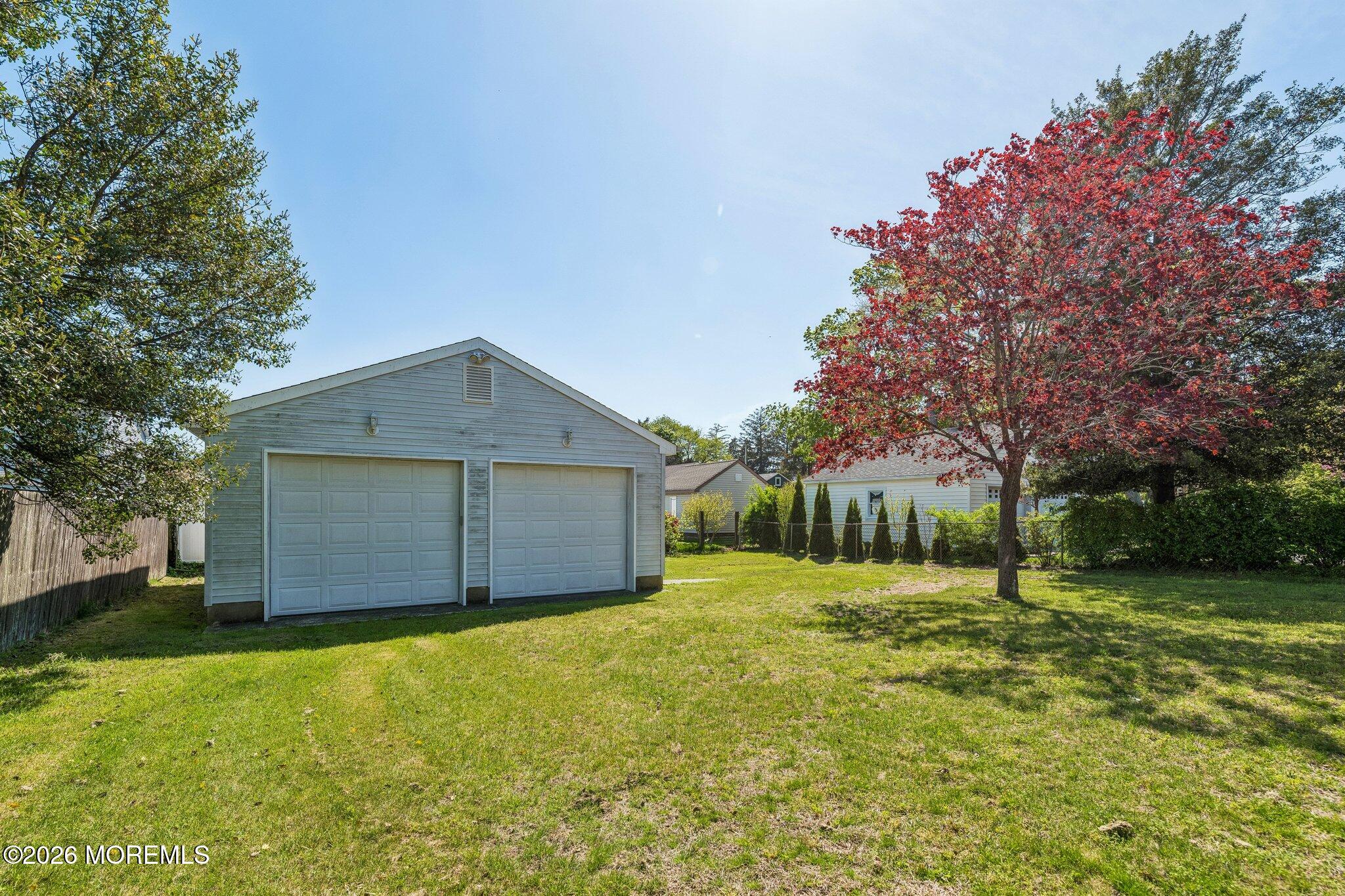 624 North Manetta Drive Point Pleasant, NJ 08742 - Photo 7 of 27 a front view of house with yard and trees