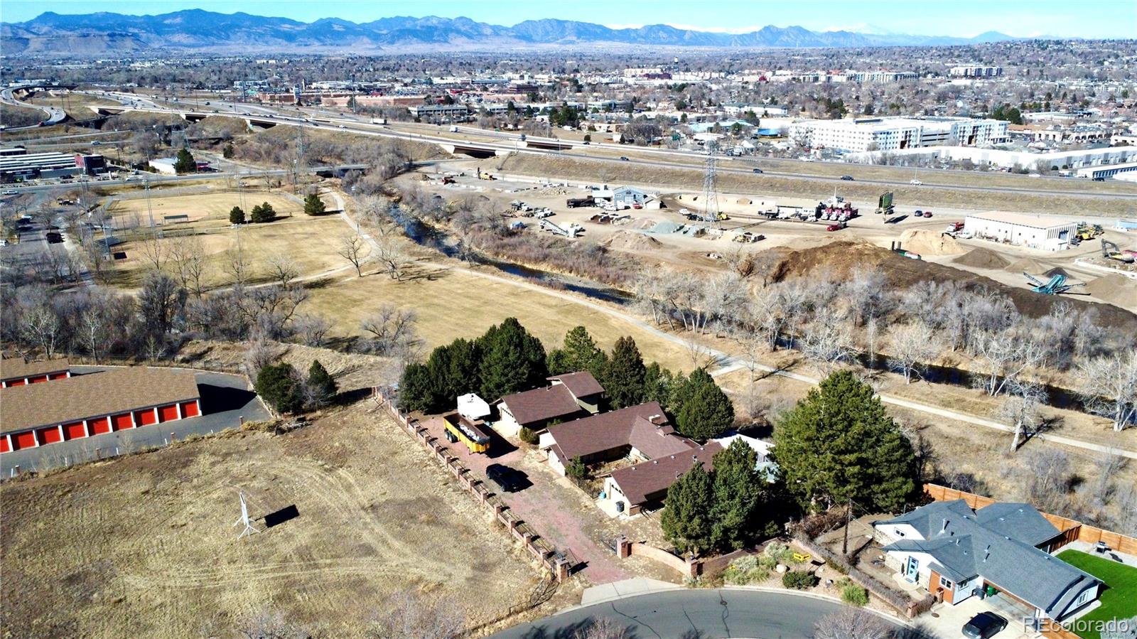 6105 West 49th Place Wheat Ridge, CO 80033 - Photo 7 of 40 an aerial view of a city