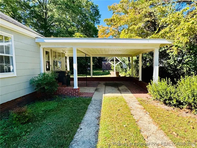 a view of porch with a swimming pool