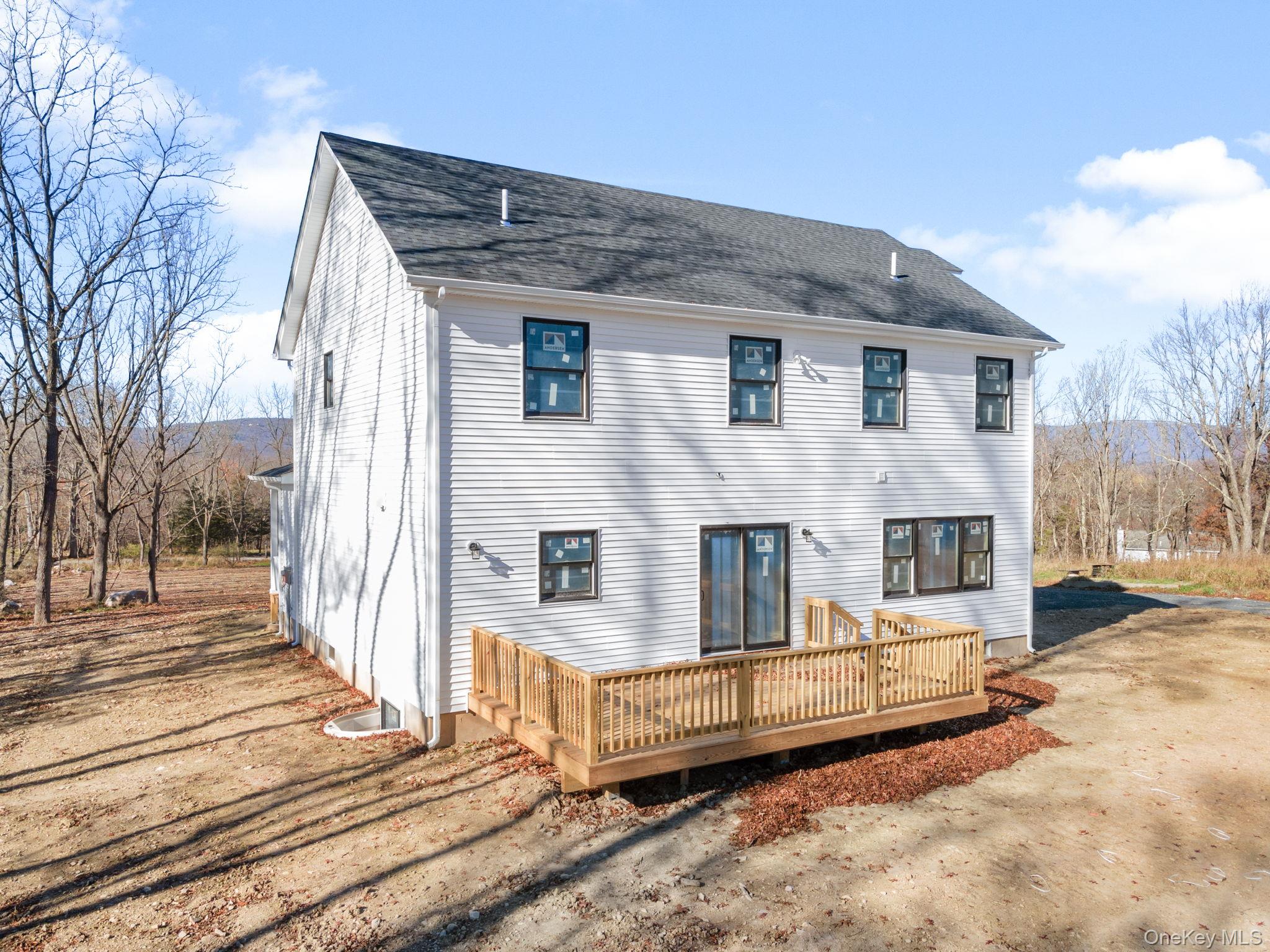 13 Harrier Ridge Drive Wallkill, NY 12589 - Photo 37 of 40 Back of house with a deck