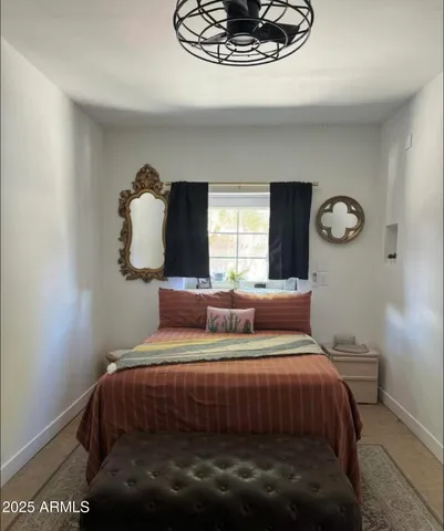 a view of a patio with table and chairs