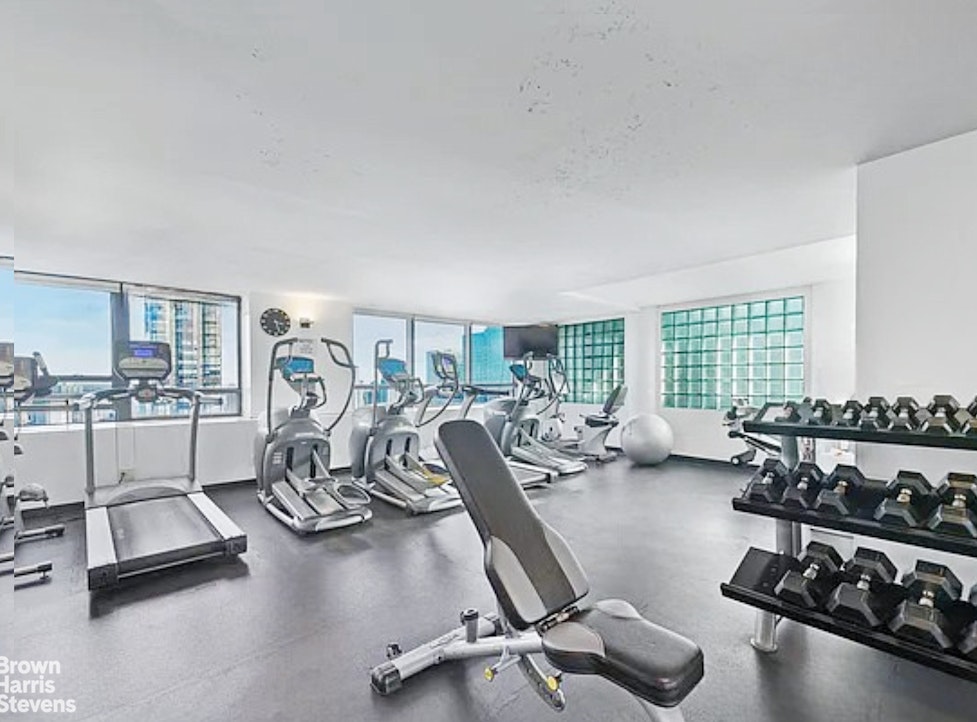240 East 47th Street, Unit 39AB Manhattan, NY 10017 - Photo 16 of 22 a view of a room with gym equipment