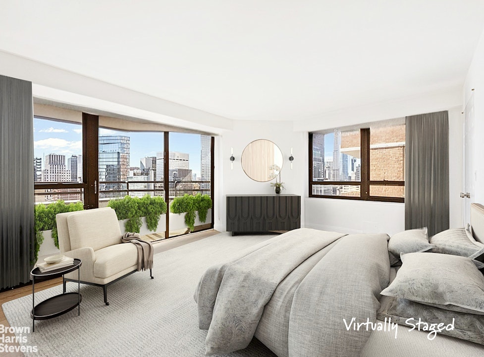 240 East 47th Street, Unit 39AB Manhattan, NY 10017 - Photo 7 of 22 a large bedroom with a large bed and a large window