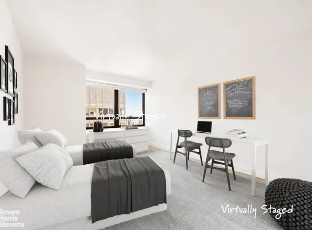 a bathroom with a granite countertop sink and a mirror a bathtub