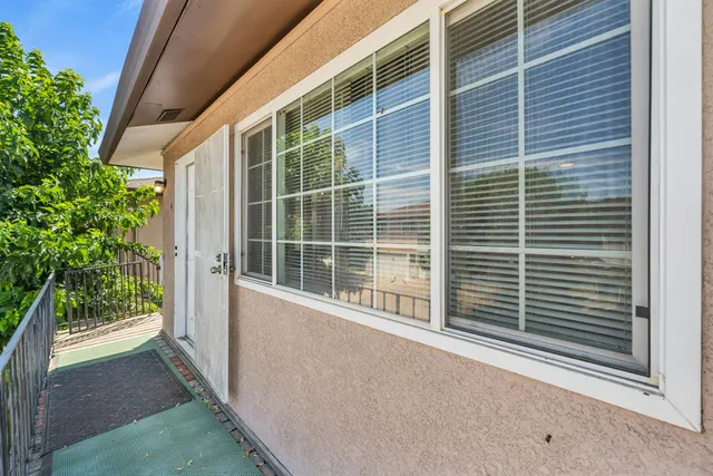 a view of house with backyard