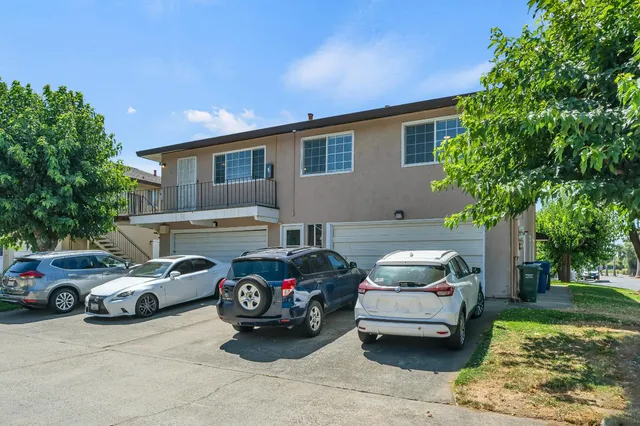 a car parked in front of a house