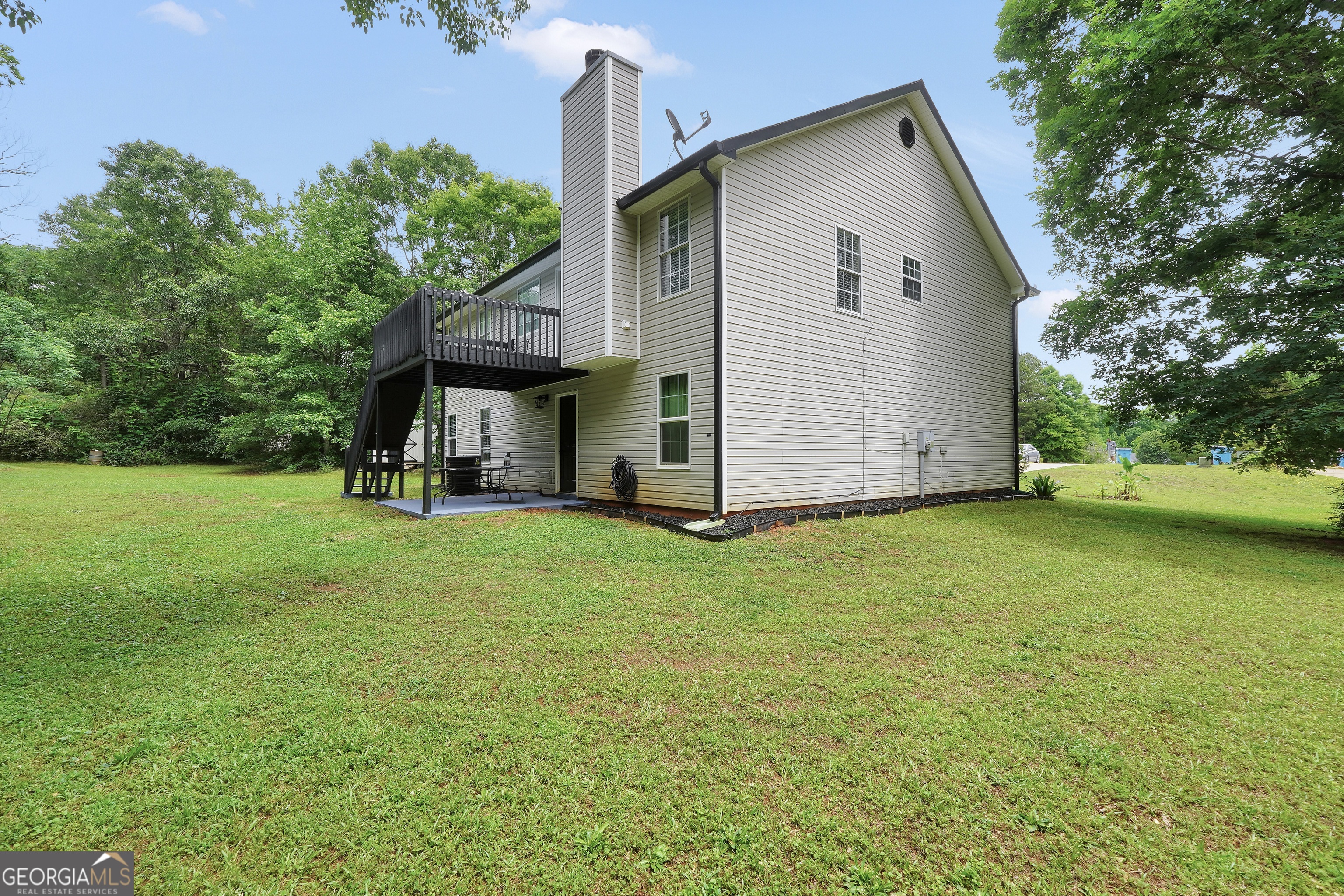 110 Westeria Way Jackson, GA 30233 - Photo 39 of 45 a view of a backyard with a garden