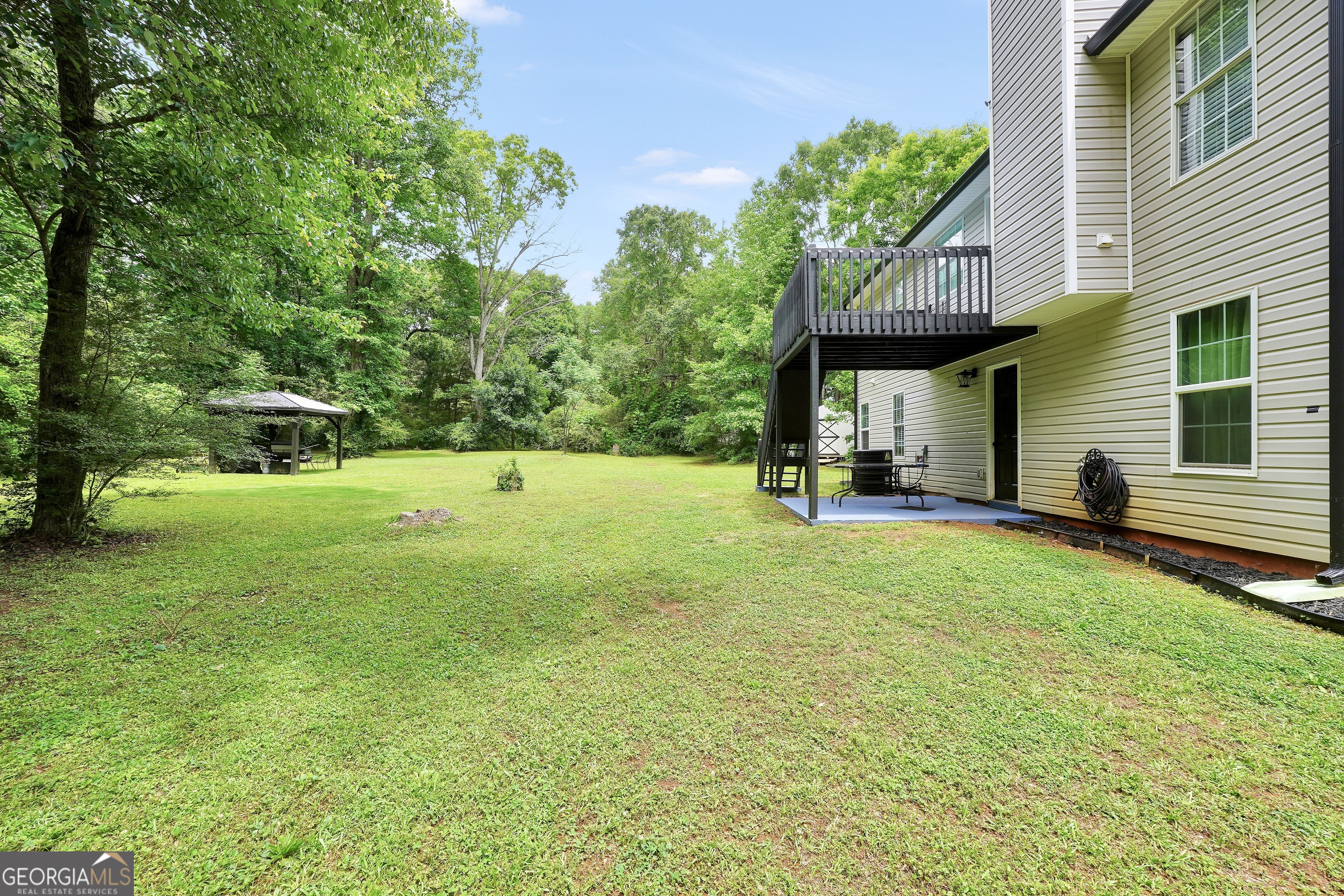 110 Westeria Way Jackson, GA 30233 - Photo 42 of 45 a view of a house with a backyard