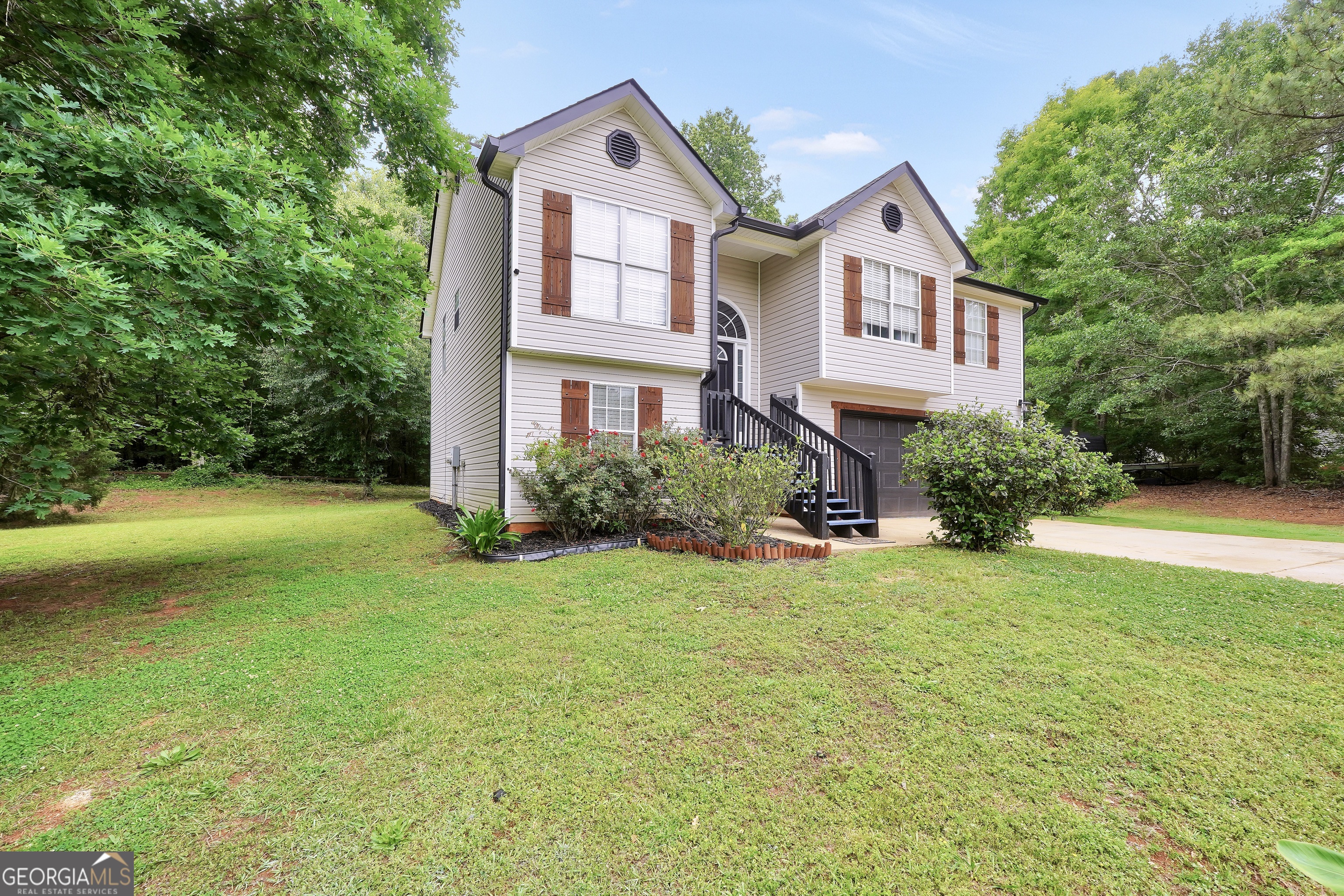 110 Westeria Way Jackson, GA 30233 - Photo 45 of 45 a front view of a house with yard and green space