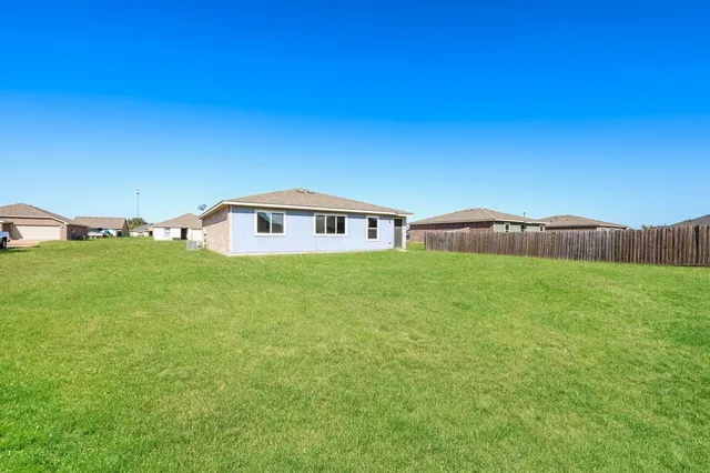 a house view with garden space