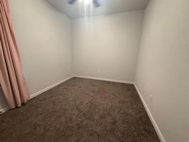 an empty room with a workbench