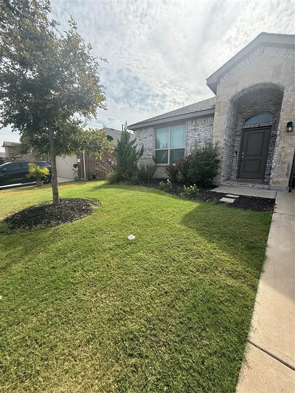 1110 Pacifica Trail Cleburne, TX 76033 - Photo 2 of 24 a view of a house with a yard and tree s