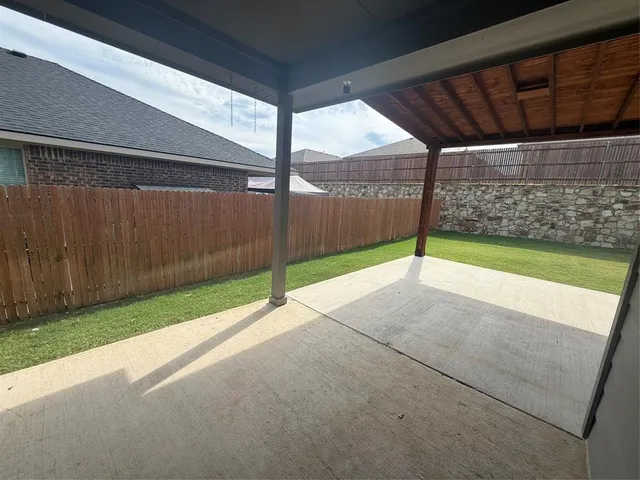 a view of a garden with an umbrella