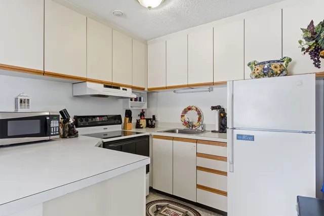 $239,900 | 75 Treetop Circle, Unit 21, Laconia, NH 03246