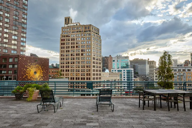 a view of a city with tall buildings