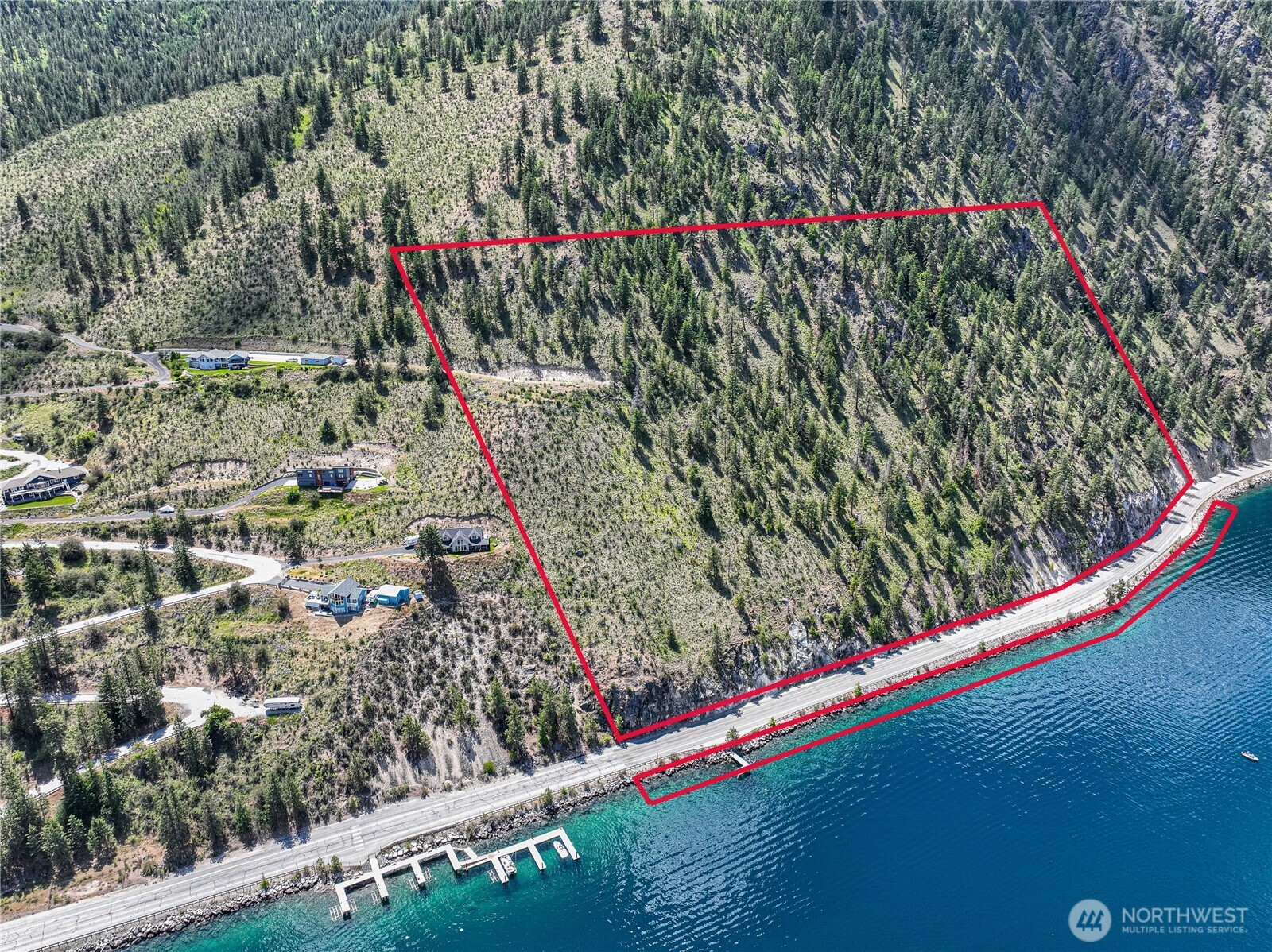 4620 South Lakeshore Road Chelan, WA 98816 - Photo 5 of 40 a view of a backyard