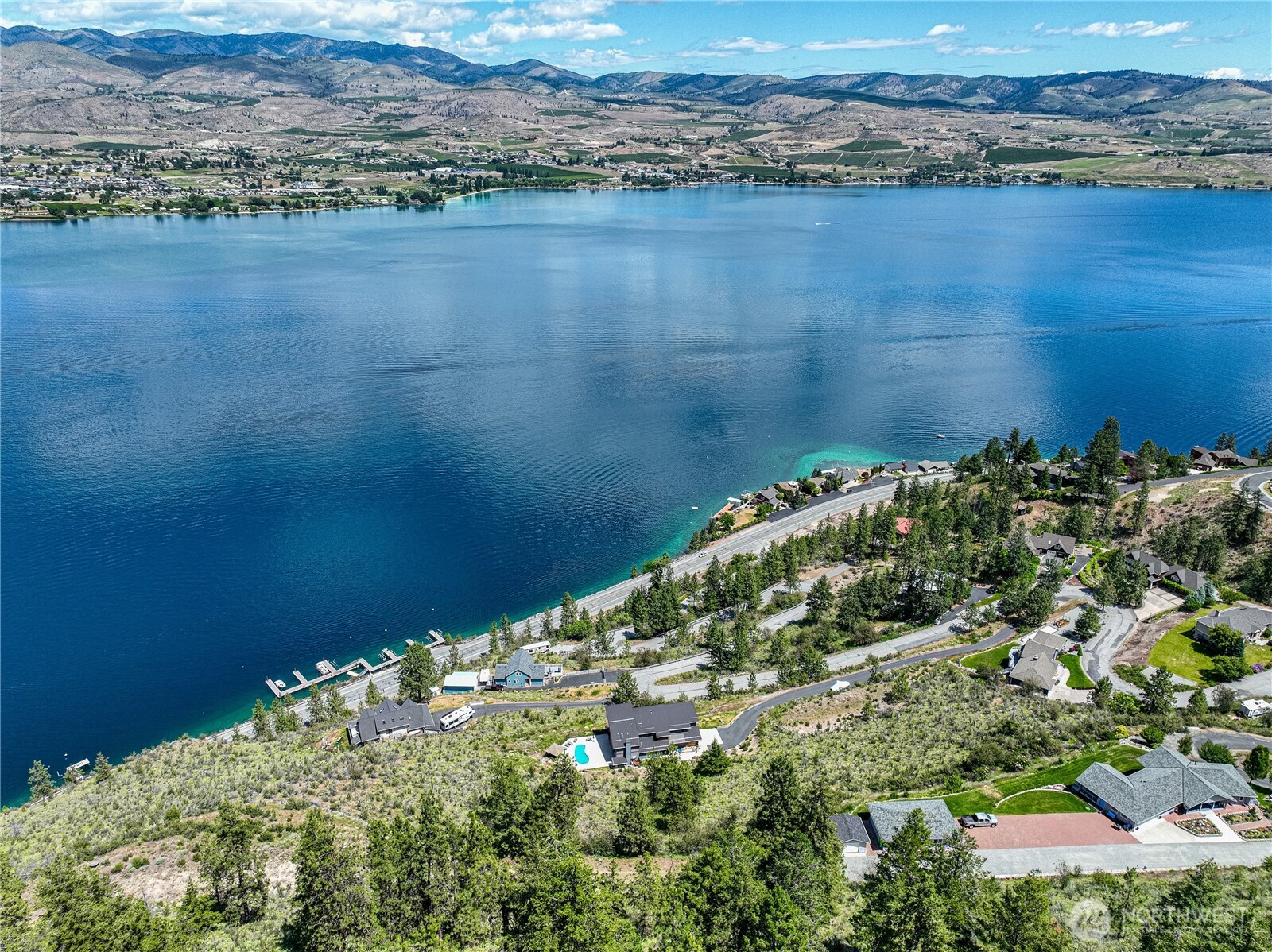 4620 South Lakeshore Road Chelan, WA 98816 - Photo 10 of 40 a view of a lake and a mountain