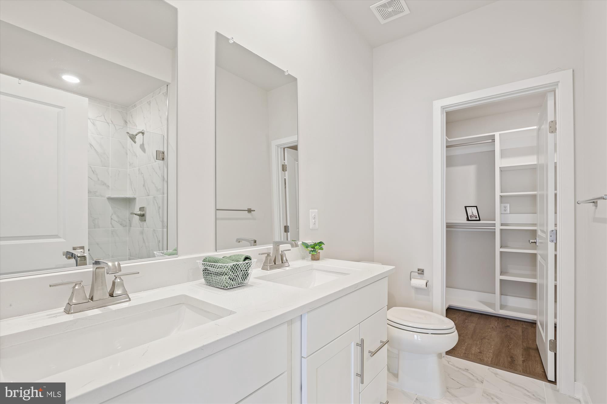 6832 General Davis Drive Northwest Washington, DC 20012 - Photo 13 of 31 a bathroom with a sink a toilet and shower