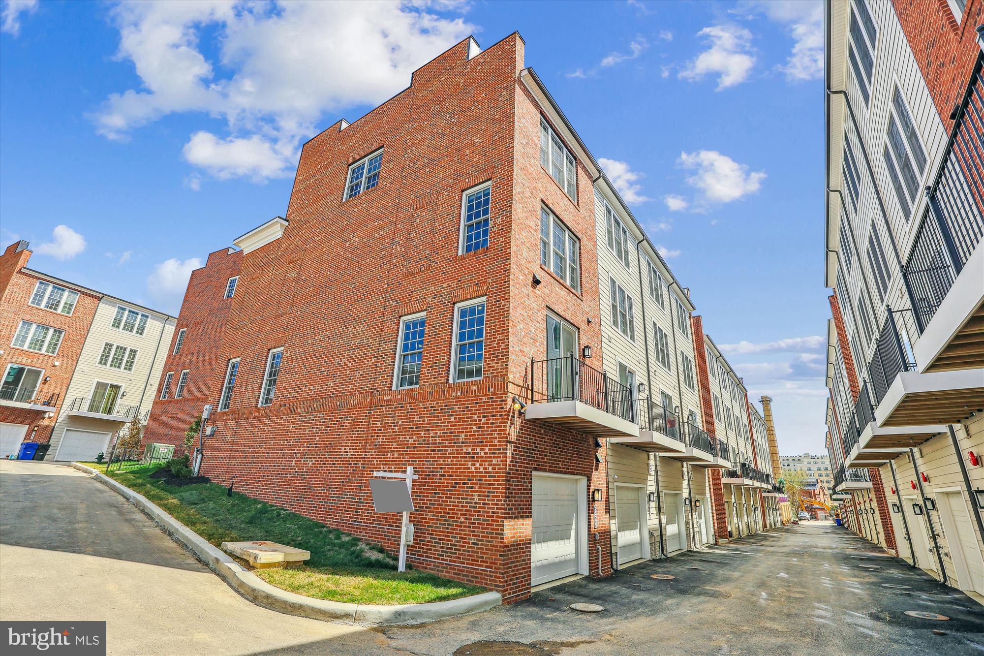 6832 General Davis Drive Northwest Washington, DC 20012 - Photo 31 of 31 a front view of a house with a yard