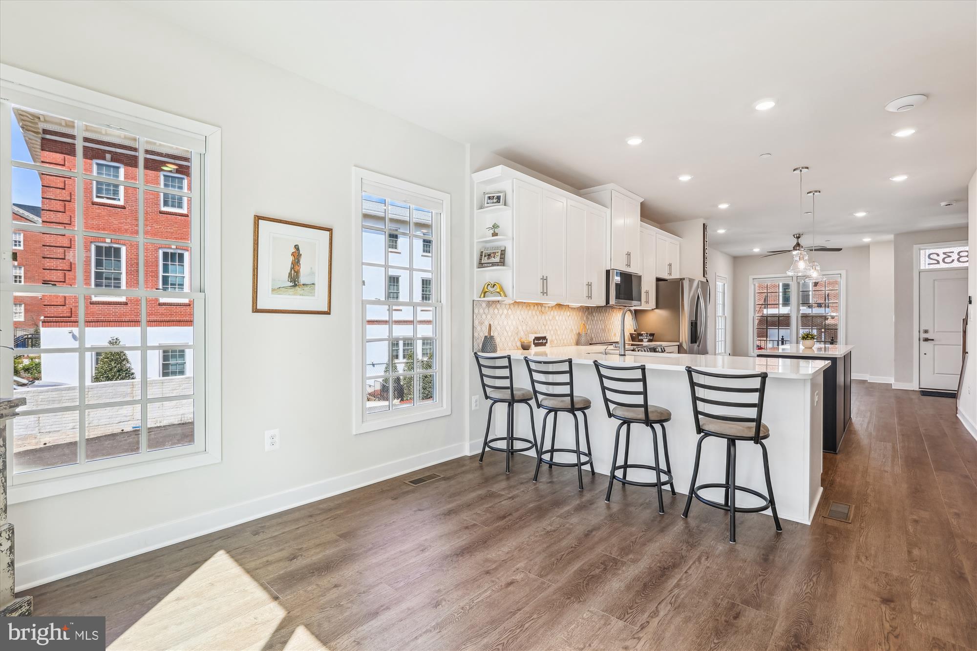 6832 General Davis Drive Northwest Washington, DC 20012 - Photo 7 of 31 a view of a dining room with furniture and wooden floor