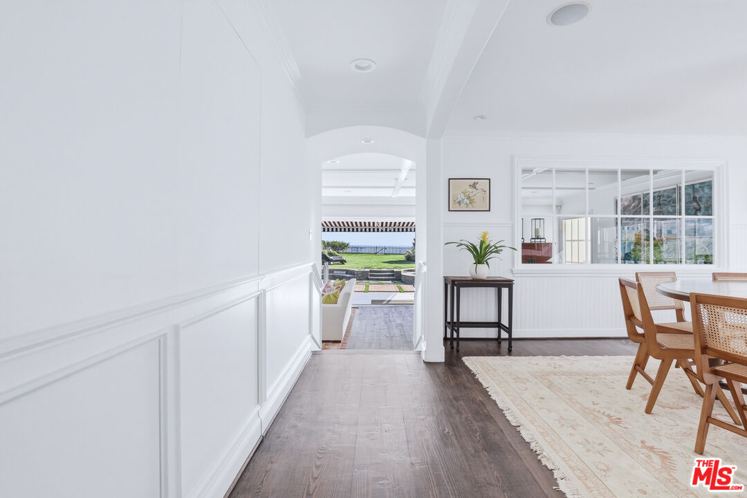 30810 Broad Beach Road Malibu, CA 90265 - Photo 24 of 55 a view of a dining room with furniture window and wooden floor