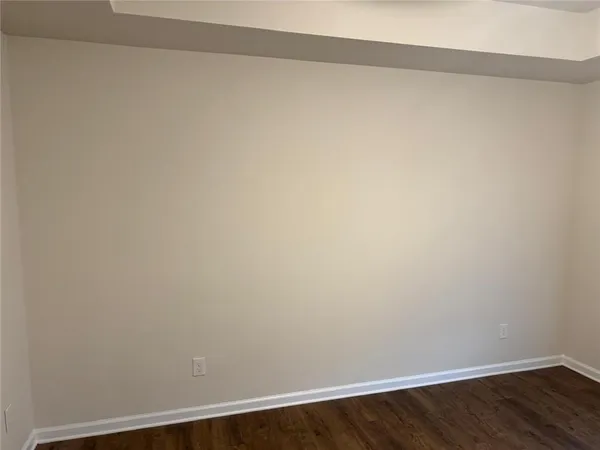 a view of small space with wooden floor