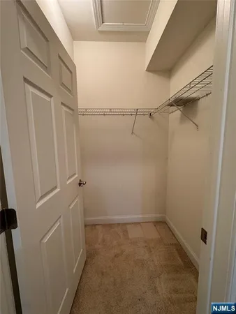 a view of a room with racks on the wall