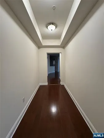 a view of an empty room and closet