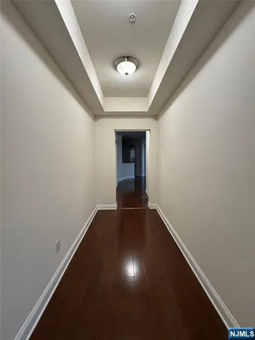 a view of an empty room and closet