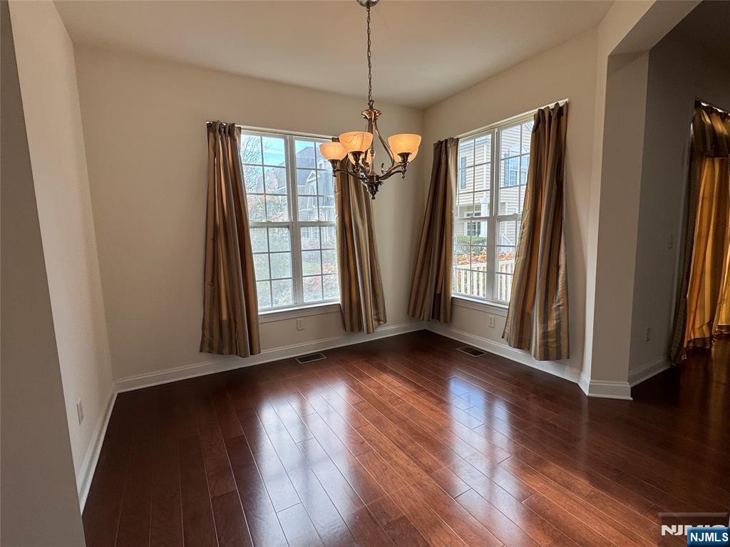 306 April Way Middletown, NJ 07748 - Photo 5 of 26 a view of a room with wooden floor and balcony