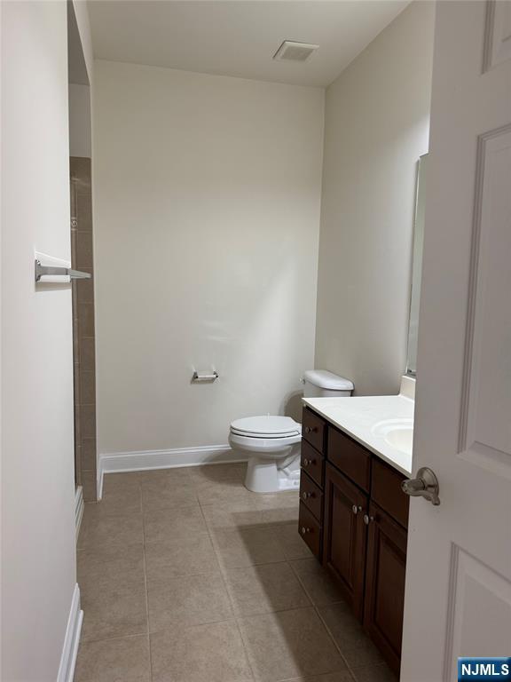 306 April Way Middletown, NJ 07748 - Photo 8 of 26 a spacious bathroom with a granite countertop sink a toilet and a shower