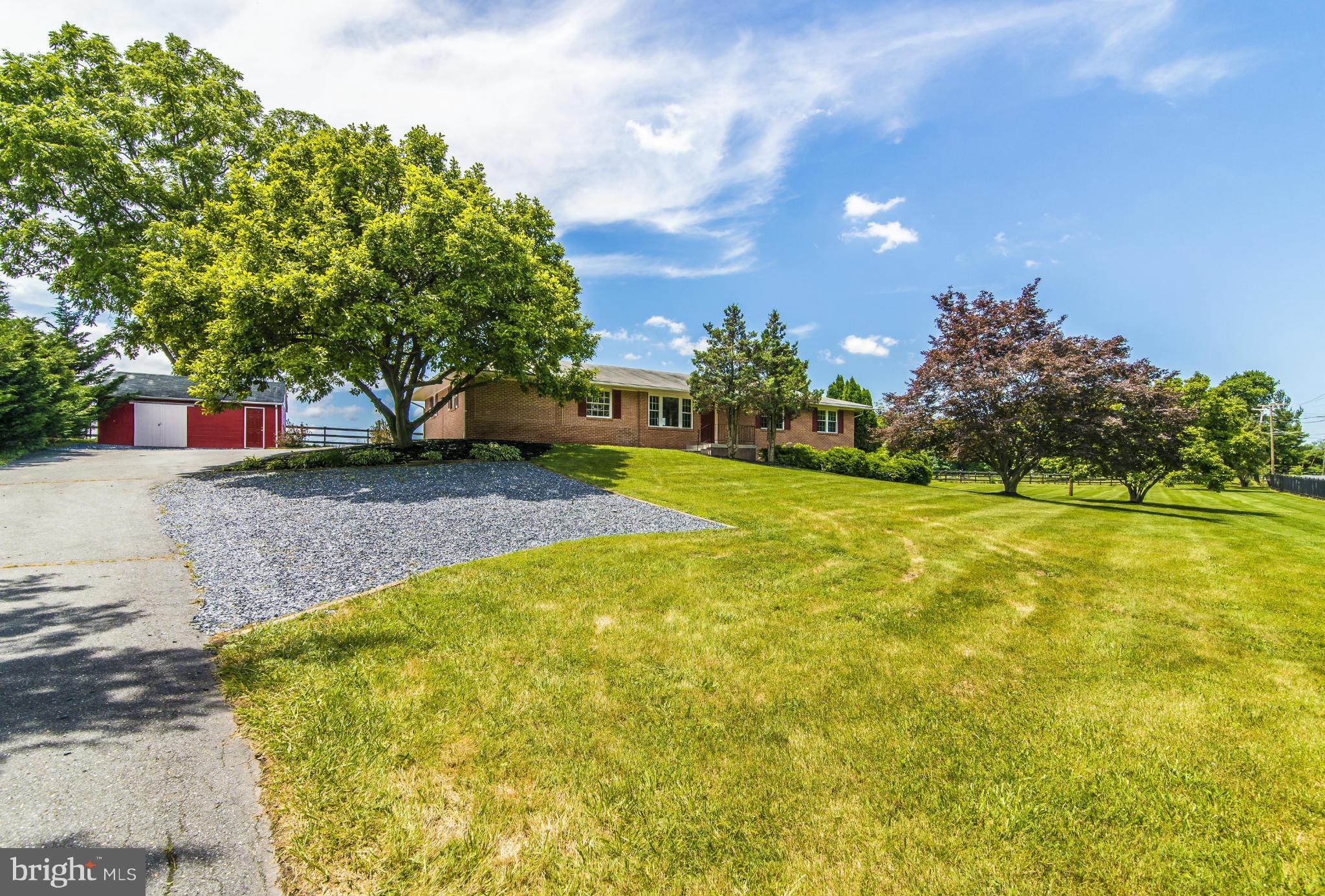 18126 Beallsville Road Poolesville, MD 20837 - Photo 1 of 21 a view of a backyard